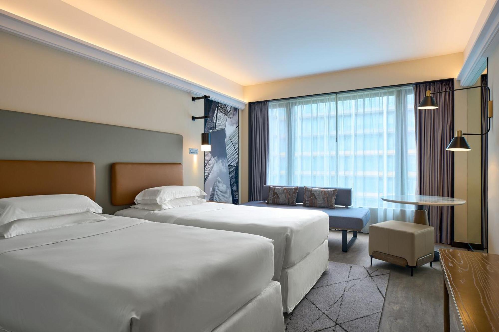 Zweibettzimmer mit Stadtblick